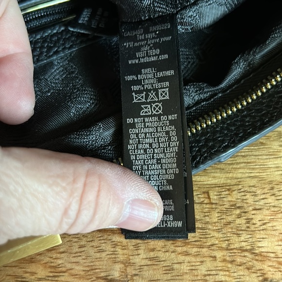 Ted Baker Tote with gold accents.  Excellent used condition. Dust bag included - Picture 6 of 7